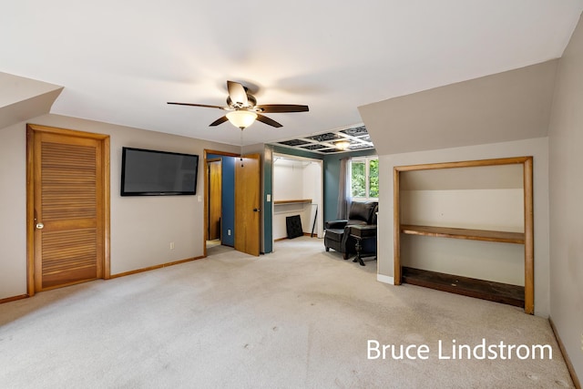 15520 157th Ave, Big Rapids, MI 49307 - unfurnished living room featuring a ceiling fan, carpet, and a desk