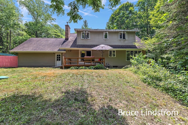 15520 157th Ave, Big Rapids, MI 49307 - rear view of property with a chimney, a wooden deck, and roof with shingles