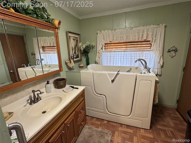 2185 Roslyn Ave, Flint, MI 48532 - full bath with a bath, vanity, and ornamental molding