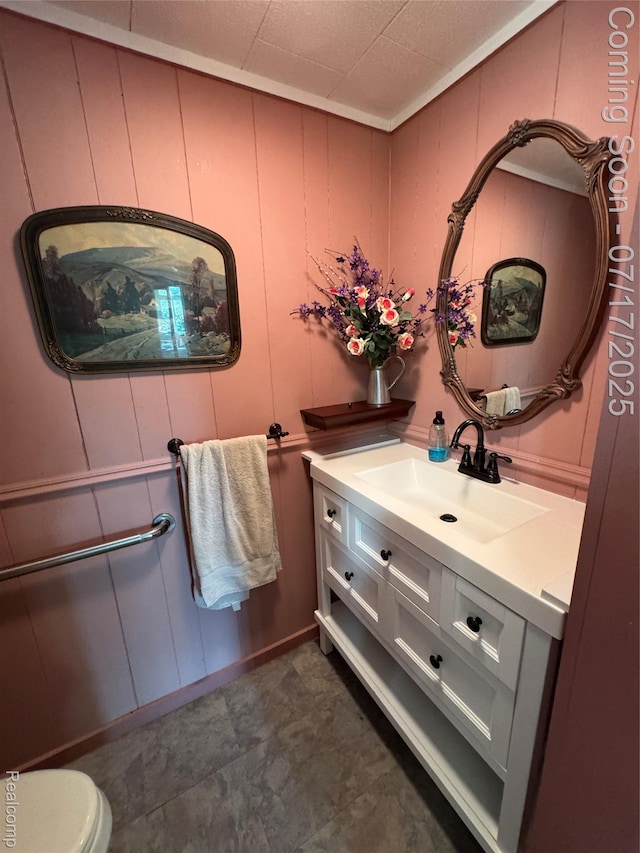 2185 Roslyn Ave, Flint, MI 48532 - bathroom featuring vanity and a decorative wall