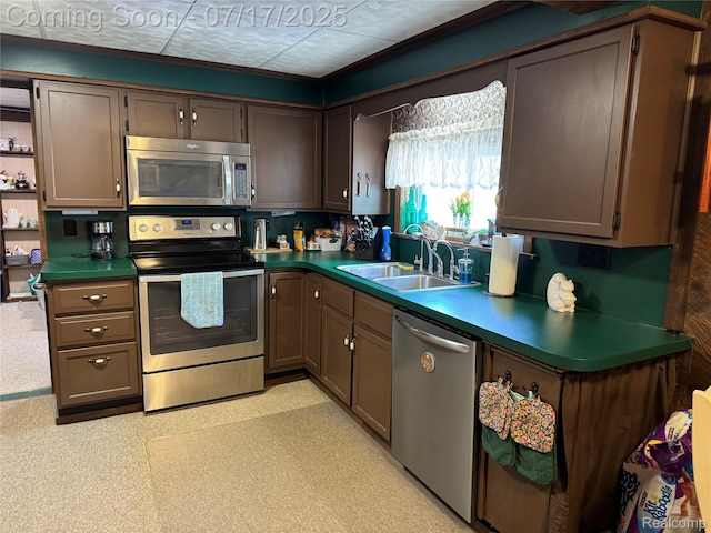 2185 Roslyn Ave, Flint, MI 48532 - kitchen with appliances with stainless steel finishes, open shelves, and dark countertops