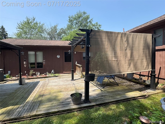 2185 Roslyn Ave, Flint, MI 48532 - wooden terrace with a pergola