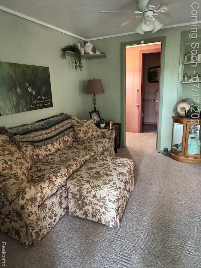 2185 Roslyn Ave, Flint, MI 48532 - carpeted living room featuring a ceiling fan and ornamental molding
