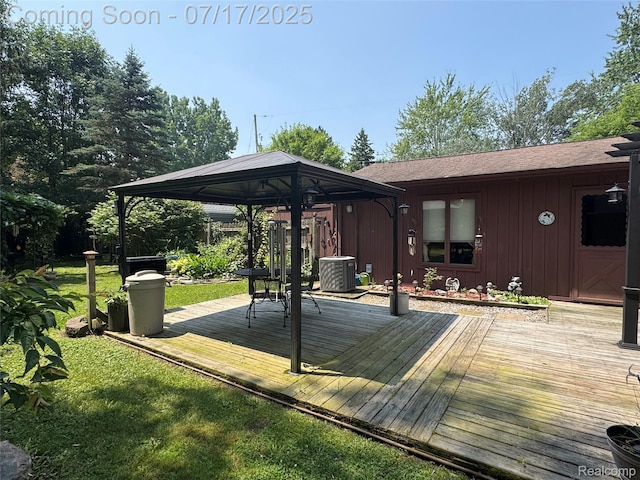 2185 Roslyn Ave, Flint, MI 48532 - wooden deck featuring a gazebo and a yard
