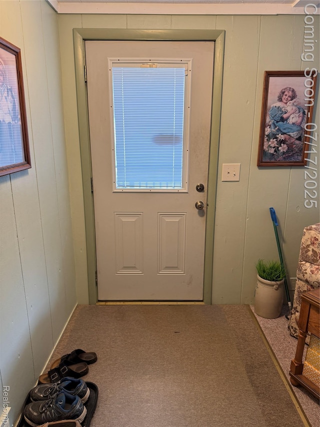 2185 Roslyn Ave, Flint, MI 48532 - entryway featuring carpet and a decorative wall