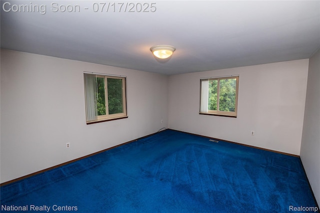 625 Ten Point Dr, Rochester Hills, MI 48309 - carpeted spare room featuring baseboards