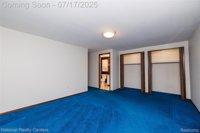 625 Ten Point Dr, Rochester Hills, MI 48309 - unfurnished bedroom featuring two closets, carpet floors, and ensuite bath