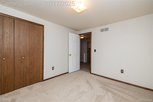 625 Ten Point Dr, Rochester Hills, MI 48309 - unfurnished bedroom featuring light colored carpet and a closet