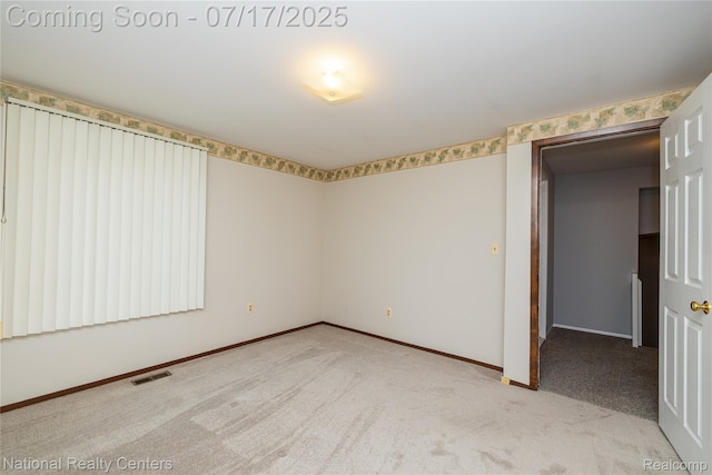 625 Ten Point Dr, Rochester Hills, MI 48309 - spare room featuring carpet and baseboards
