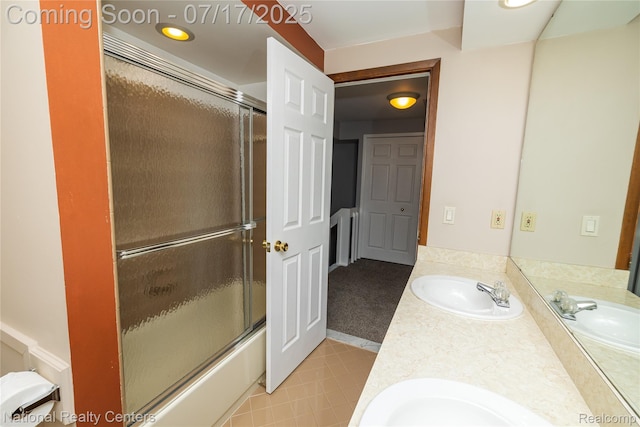 625 Ten Point Dr, Rochester Hills, MI 48309 - bathroom with double vanity, enclosed tub / shower combo, and recessed lighting