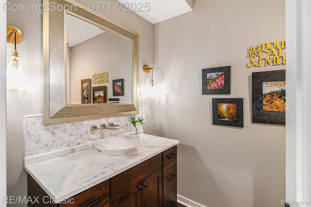 7171 Lucy Dr, Dexter, MI 48130 - bathroom featuring vanity and backsplash