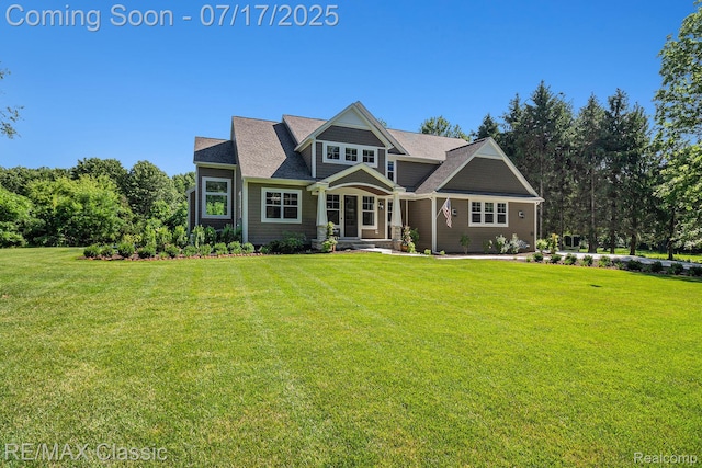 7171 Lucy Dr, Dexter, MI 48130 - view of front of home with a front lawn