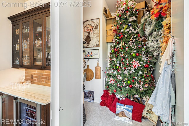 7171 Lucy Dr, Dexter, MI 48130 - corridor featuring wine cooler and carpet floors