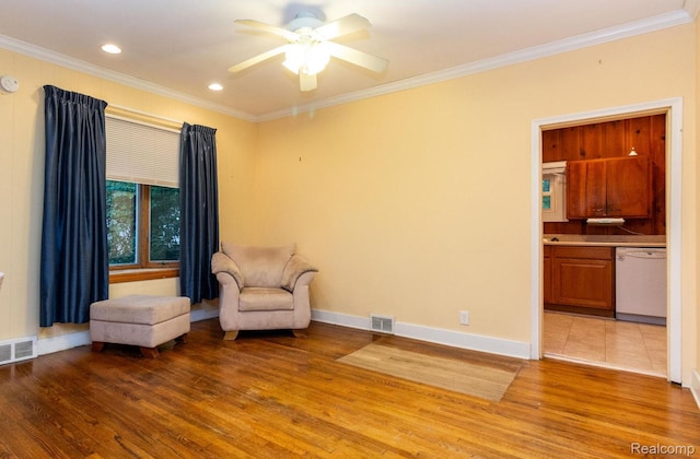 19817 Martin Rd, Saint Clair Shores, MI 48081 - sitting room with light wood-type flooring, crown molding, ceiling fan, and recessed lighting