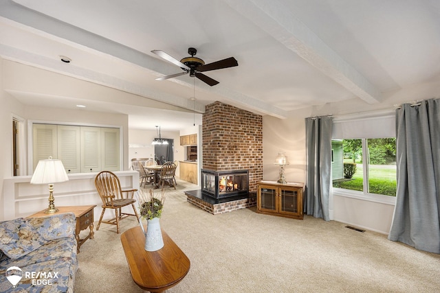8208 E Potter Rd, Davison, MI 48423 - living room featuring ceiling fan, carpet flooring, and a brick fireplace