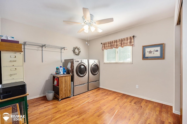 8208 E Potter Rd, Davison, MI 48423 - washroom featuring washing machine and clothes dryer, ceiling fan, and light wood-type flooring
