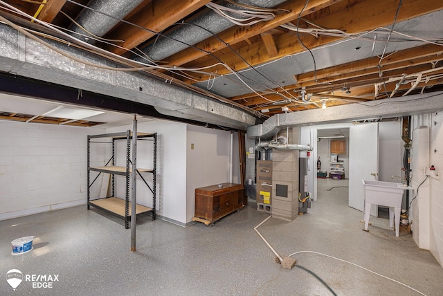 8208 E Potter Rd, Davison, MI 48423 - unfinished below grade area featuring concrete block wall and gas water heater