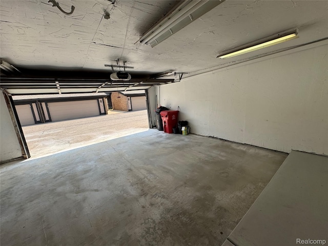5216 Brett Ct, West Bloomfield, MI 48322 - garage with a garage door opener