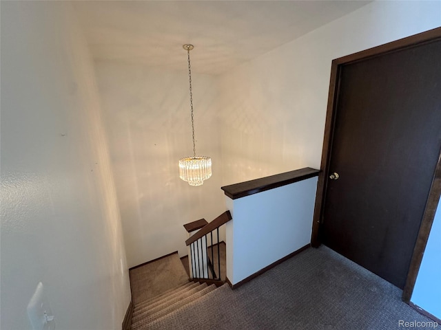 5216 Brett Ct, West Bloomfield, MI 48322 - staircase featuring carpet and a chandelier