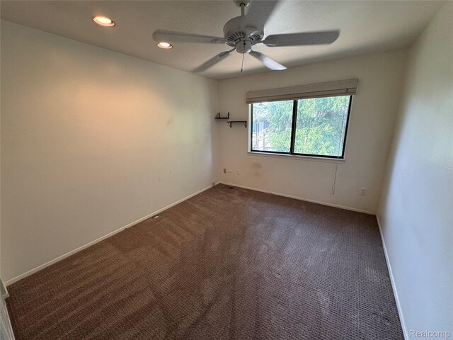5216 Brett Ct, West Bloomfield, MI 48322 - unfurnished room with dark carpet, ceiling fan, and recessed lighting