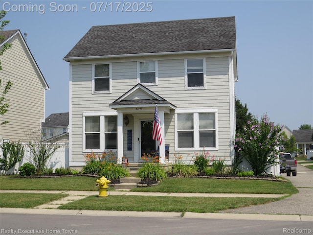 32141 Channing St, New Haven, MI 48048 - view of front of home with a front lawn