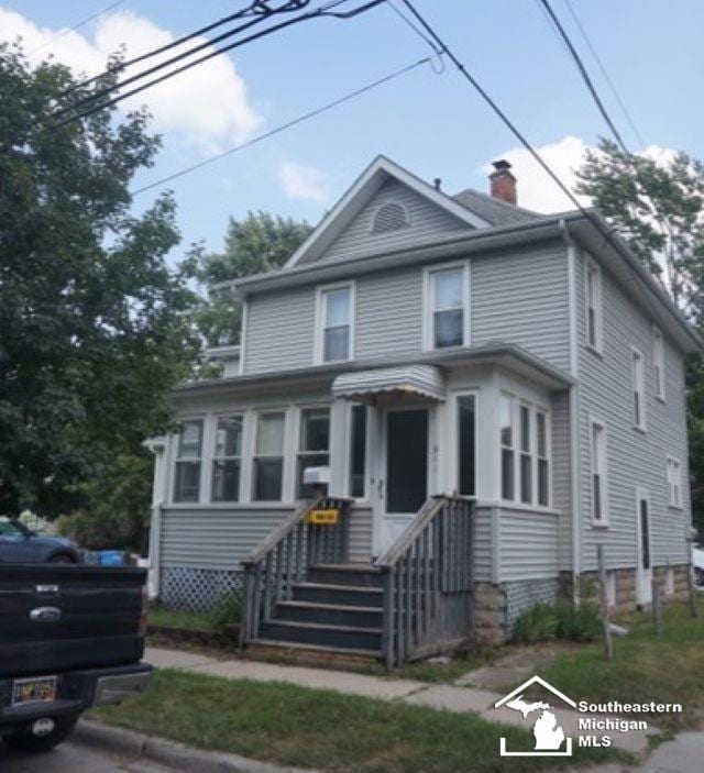 611 Hubble, Monroe, MI 48161 - traditional style home featuring a chimney