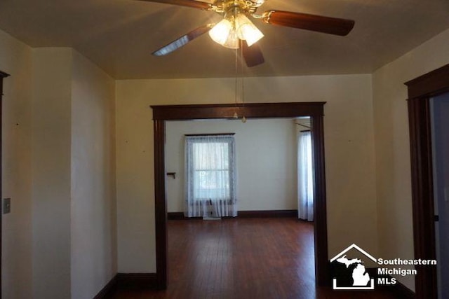 611 Hubble, Monroe, MI 48161 - hall with baseboards and dark wood-type flooring