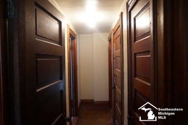 611 Hubble, Monroe, MI 48161 - hall featuring baseboards and wood finished floors