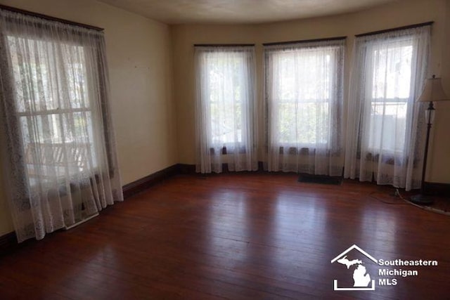 611 Hubble, Monroe, MI 48161 - spare room with wood finished floors
