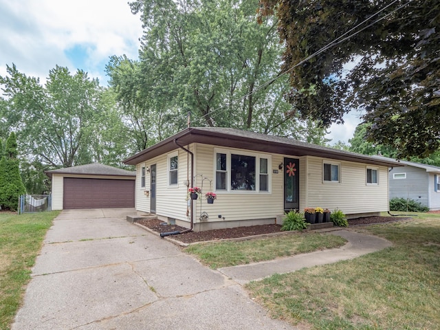 3130 27th St SW, Grandville, MI 49418 - single story home featuring an outdoor structure, a front yard, and a detached garage