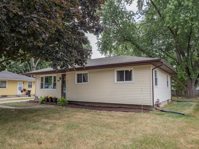 3130 27th St SW, Grandville, MI 49418 - ranch-style home with a front yard