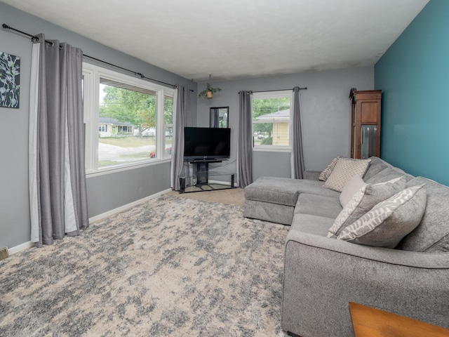 3130 27th St SW, Grandville, MI 49418 - carpeted living room featuring baseboards