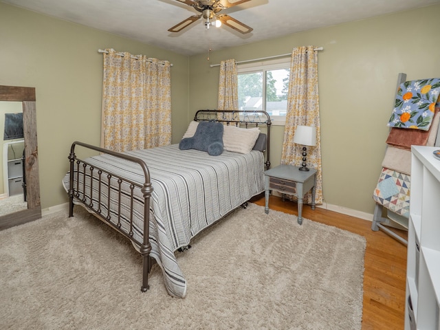 3130 27th St SW, Grandville, MI 49418 - bedroom with wood finished floors and a ceiling fan