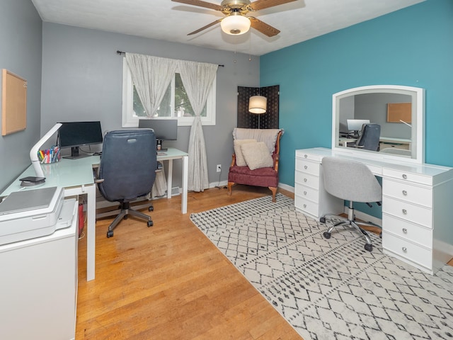 3130 27th St SW, Grandville, MI 49418 - home office featuring ceiling fan and wood finished floors
