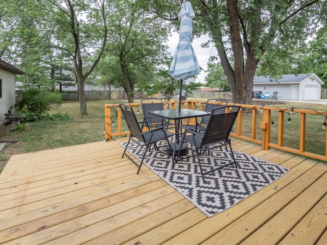 3130 27th St SW, Grandville, MI 49418 - deck with a fenced backyard and outdoor dining space