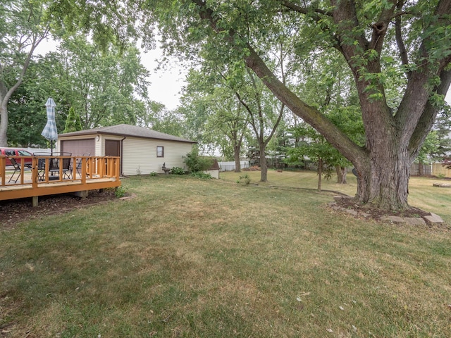 3130 27th St SW, Grandville, MI 49418 - view of green lawn featuring a deck