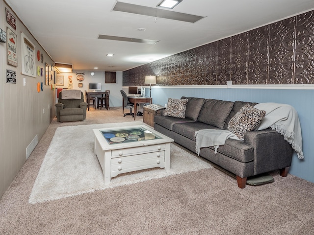 3130 27th St SW, Grandville, MI 49418 - living area featuring carpet floors and attic access