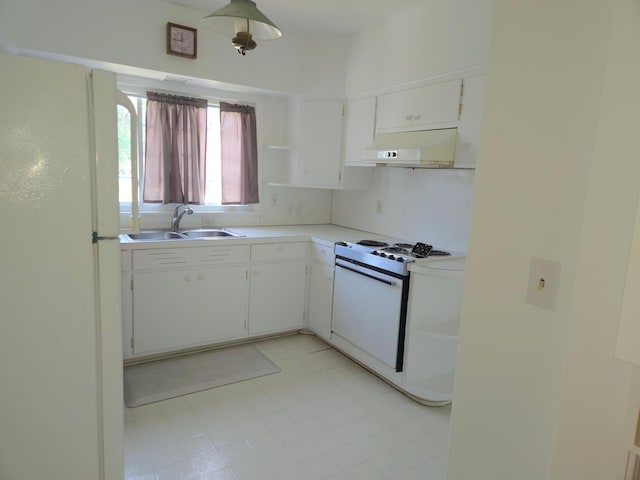 1115 W Maumee St, Adrian, MI 49221 - kitchen with white appliances, under cabinet range hood, light countertops, white cabinetry, and open shelves