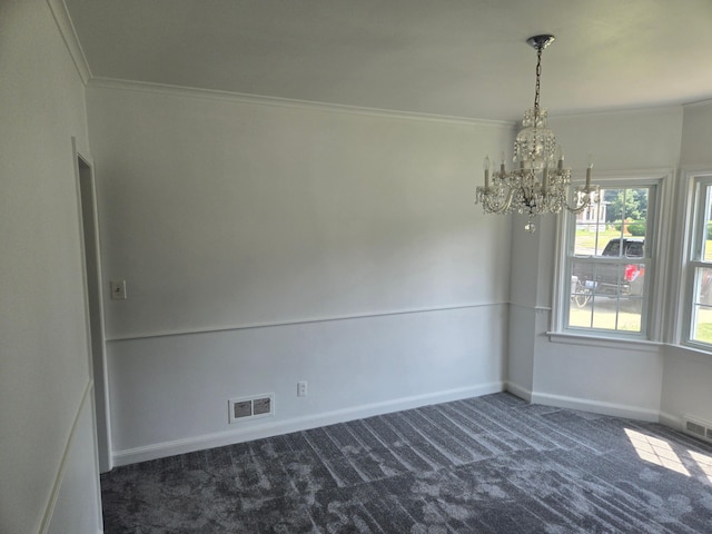 1115 W Maumee St, Adrian, MI 49221 - spare room with dark carpet, a chandelier, and crown molding
