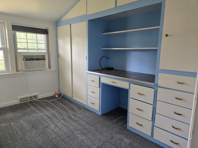 1115 W Maumee St, Adrian, MI 49221 - unfurnished office with built in study area, dark carpet, lofted ceiling, and cooling unit