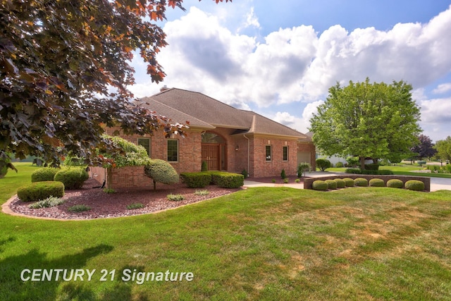 43 Sawmill Creek Trl, Saginaw, MI 48603 - view of side of home with brick siding and a lawn