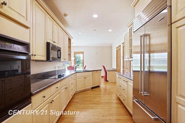 43 Sawmill Creek Trl, Saginaw, MI 48603 - kitchen with black appliances, open shelves, a peninsula, recessed lighting, and light wood-style flooring