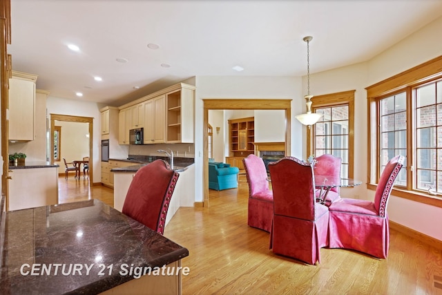 43 Sawmill Creek Trl, Saginaw, MI 48603 - dining area featuring light wood-type flooring and recessed lighting