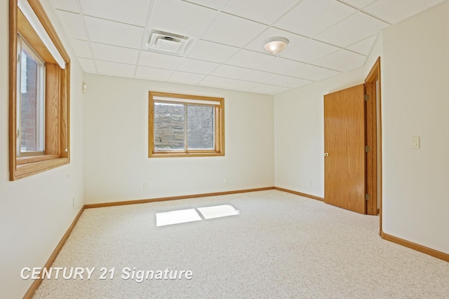 43 Sawmill Creek Trl, Saginaw, MI 48603 - carpeted empty room featuring a paneled ceiling and baseboards