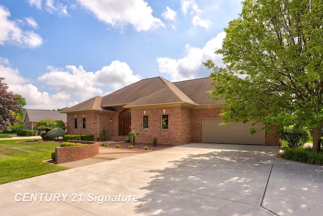 43 Sawmill Creek Trl, Saginaw, MI 48603 - single story home featuring brick siding, roof with shingles, concrete driveway, and an attached garage