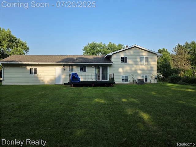 6059 Windward St, North Branch, MI 48461 - back of property with a yard and a deck