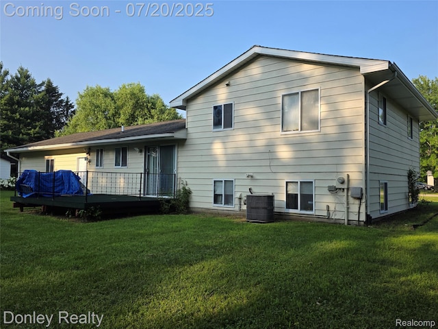 6059 Windward St, North Branch, MI 48461 - back of property featuring a yard and a deck