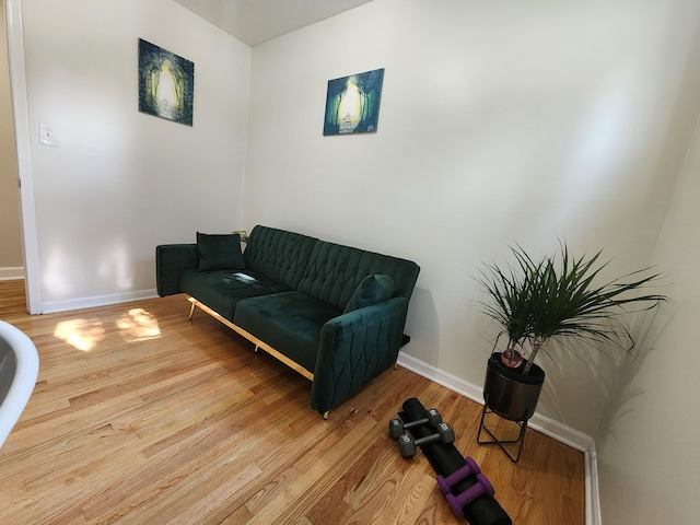 2464 Greenfield Rd, Berkley, MI 48072 - living room with light wood-type flooring and baseboards
