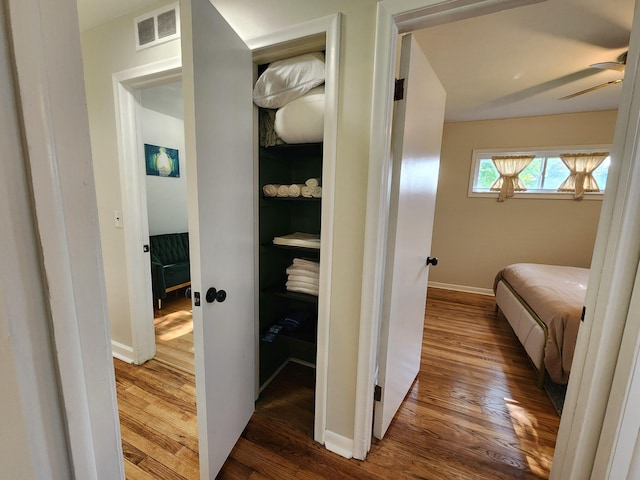 2464 Greenfield Rd, Berkley, MI 48072 - hall with wood finished floors and baseboards