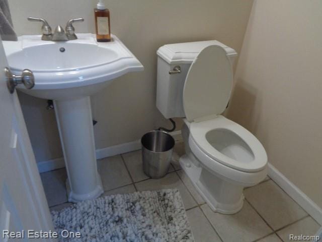 26537 Summerdale Dr, Southfield, MI 48033 - bathroom featuring toilet and tile patterned flooring